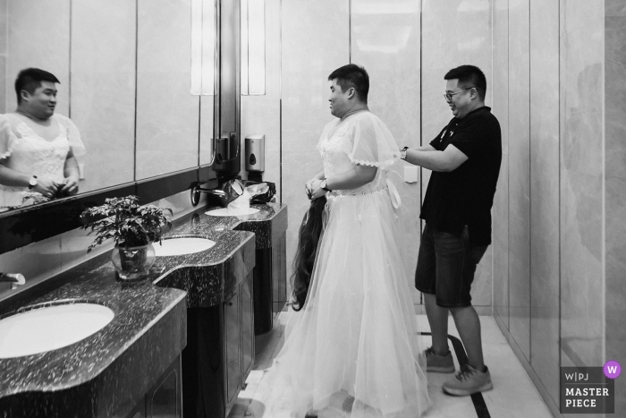 Photo by: <a href="https://www.wpja.com/contests/2019-v12/best-wedding-photographers/2547894">Qi Xiang - Nanping </a> Fujian Hotel Wedding photo of the Best man in a wedding dress