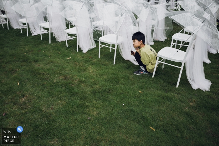 Fotos do dia do casamento em Fujian das crianças no local do casamento