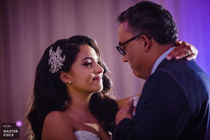 Photo by: <a href="https://www.wpja.com/contests/2019-v12/best-wedding-photographers/2548458">Miguel Gonzalez - Abington Pennsylvania</a> Wedding Photography from The Ballroom at the Ben | Bride and daddy dance. 1 tear rolling down her cheek.