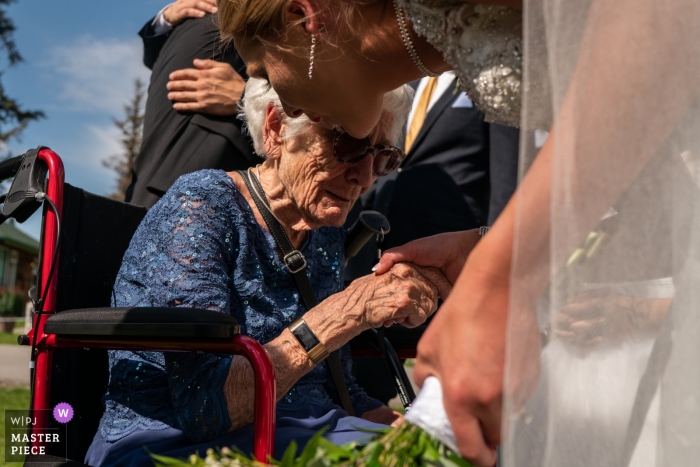 Photo by: <a href="https://www.wpja.com/contests/2019-v12/best-wedding-photographers/2548489">Dorota Karpowicz - Edmonton Alberta</a> Wedding Photography from Jasper Park Lodge, Jasper, AB, Canada | Bride and her grandmother after the ceremony, having a tender moment together