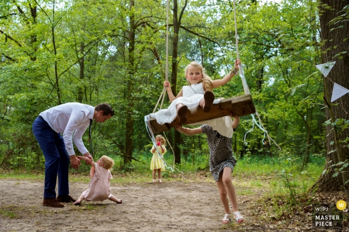 Photo by: <a href="https://www.wpja.com/contests/2019-v12/best-wedding-photographers/2548527">Indra Simons - Enschede Overijssel</a> De Lutte, Jan Wesselinkhoes wedding day photography in the trees with the kids | Watch out for the swing!