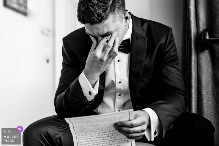 Wilton Castle, Ireland Documentary Wedding Photographer - Emotional groom reading letter from his bride on the morning of their wedding 