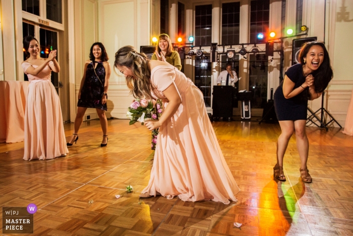 Photo by: <a href="https://www.wpja.com/contests/2019-v12/best-wedding-photographers/2548730">Chris Shum - Sunnyvale California</a> San Francisco Reception Venue Wedding Phtography of the Bouquet toss