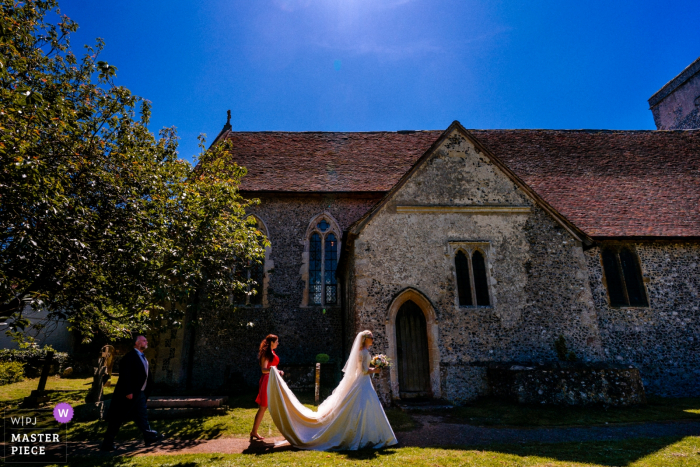 Photo by: <a href="https://www.wpja.com/contests/2019-v12/best-wedding-photographers/2548737">Paul Rogers - Hitchin Hertfordshire</a> Barham, Kent, UK wedding reportage photographer | Bride arrives at church for her wedding ceremony