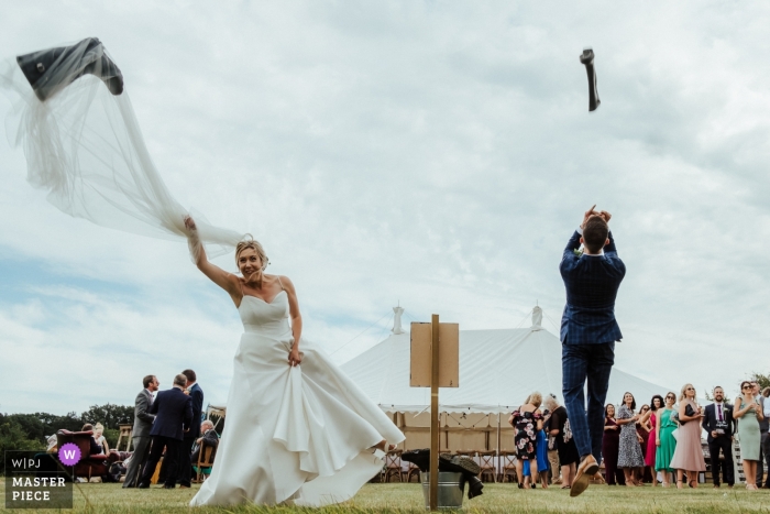 Photo by: <a href="https://www.wpja.com/contests/2019-v13/best-wedding-photographers/2549369">Matt Ebbage - Whitstable Kent</a> Stowmarket, Suffolk - reception venue photographer: It's not a Suffolk countryside wedding if you don't have welly-hanging, right?!