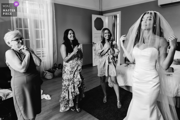 Photo by: <a href="https://www.wpja.com/contests/2019-v13/best-wedding-photographers/2549431">Sylvain Garderes - Beost </a> Montagnac, Domaine Saint Hilaire, France wedding photography of Bride putting veil