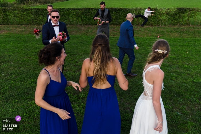 Photo by: <a href="https://www.wpja.com/contests/2019-v13/best-wedding-photographers/2550173">Philippe Swiggers - Bekkevoort </a> Abdij van Herkenrode Wedding Venue Reception Photography - Bouquet, toss, fun, bride, groom, groomsmen, bridesmaids