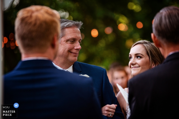 Photo by: <a href="https://www.wpja.com/contests/2019-v13/best-wedding-photographers/2550232">Kathleen Ricker - Linthicum Heights Maryland</a> Wedding Ceremony Photographer for the Overhills Manor - Baltimore Maryland - Walking down the aisle with daddy
