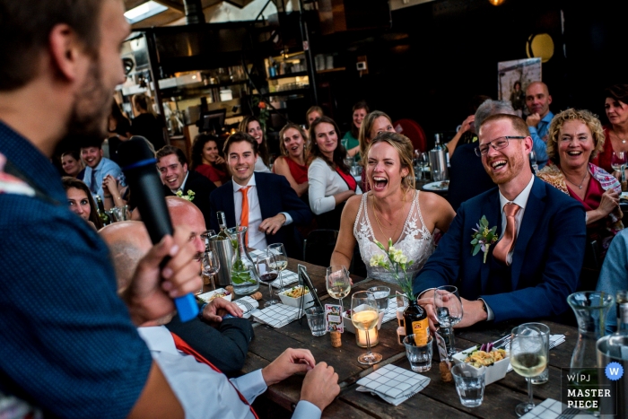 Photo by: <a href="https://www.wpja.com/contests/2019-v13/best-wedding-photographers/2550349">Linda Bouritius - Amersfoort Utrecht</a> Reception Photography at Pont 13, Amsterdam - The reactions to the speech of the best men at the wedding.