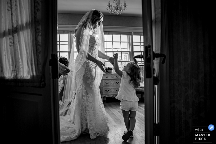 Photo by: <a href="https://www.wpja.com/contests/2019-v13/best-wedding-photographers/2550644">Victoria Sprung - Chicago Illinois</a> Wedding Venue Photography at Danada House, Wheaton, IL - flower girl and bride getting ready