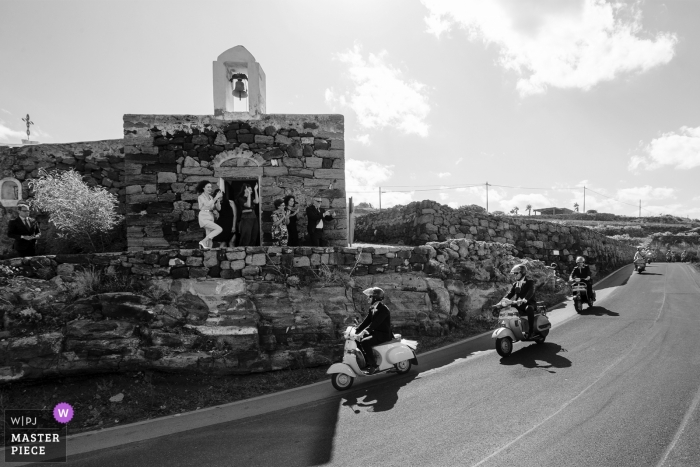 Photo by: <a href="https://www.wpja.com/contests/2019-v13/best-wedding-photographers/2550955">Nino Lombardo - Taormina Trapani</a> Wedding Photography from the Ceremony in Pantelleria Church - The original arrival for the groom and groomsman in Vespa