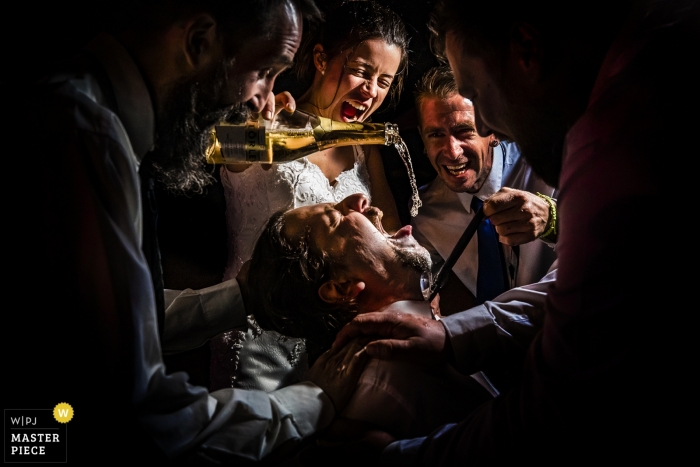 Photo by: <a href="https://www.wpja.com/contests/2019-v13/best-wedding-photographers/2551001">Tunde Koncsol - Budapest</a> Zala Springs Golf Resort Zalacsány Weding Photography | The bride gives champagne to the groom