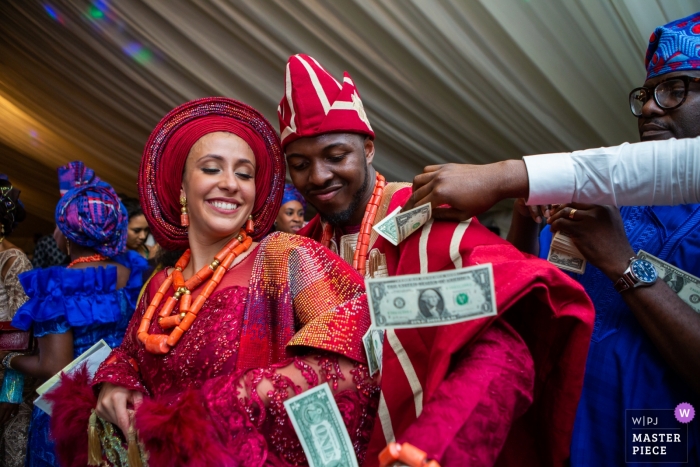 Photo by: <a href="https://www.wpja.com/contests/2019-v13/best-wedding-photographers/2551166">Obi Nwokedi - London London</a> Five Gables, Netherne, London Wedding Photos - Traditional Wedding Dance Photography with Money Flying