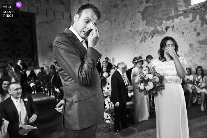 Photo by: <a href="https://www.wpja.com/contests/2019-v14/best-wedding-photographers/2552623">Franck Boutonnet - Lyon </a> Lyon Wedding Photogarpher - Church image of The bride and groom getting emotional after the first look at the beginning of the ceremony
