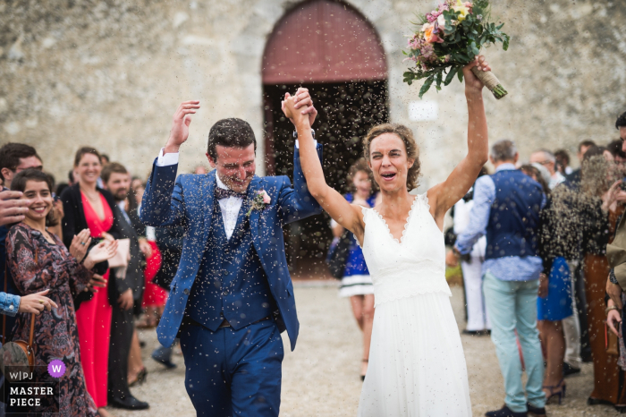 Photo by: <a href="https://www.wpja.com/contests/2019-v14/best-wedding-photographers/2552907">Franck Petit - Serignac sur Garonne </a> Chateau La Hitte Wedding Photos of Bride and Groom celebrating after ceremony