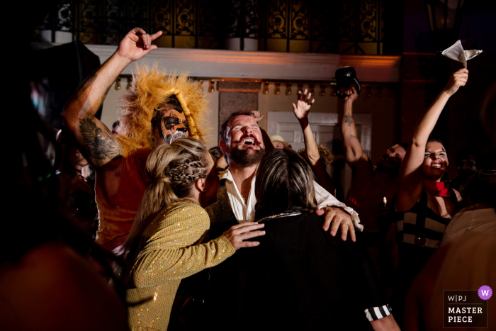 Photo by: <a href="https://www.wpja.com/contests/2019-v14/best-wedding-photographers/2553017">Julie Ambos - Key West Florida</a> Costume reception...The Lightner, St Augustine | Florida Wedding Photography | Fun on the dance floor with costume reception...