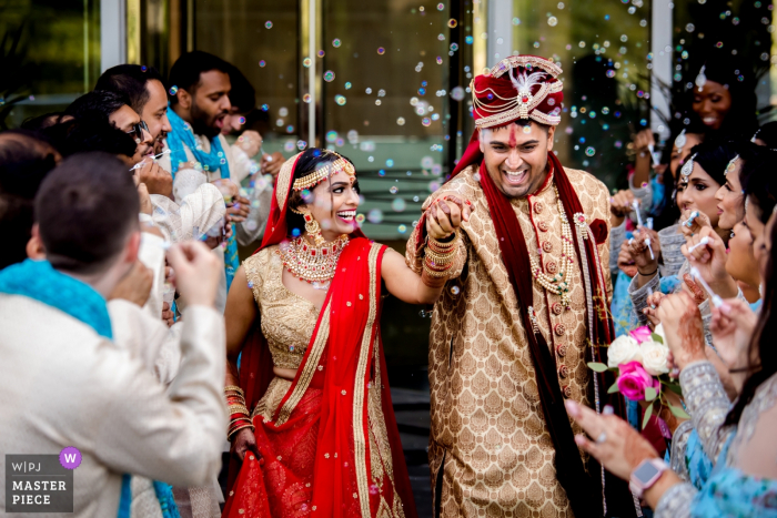 Foto door: <a href="https://www.wpja.com/contests/2019-v14/best-wedding-photographers/2553442"> Tamara Gavrilovic - Chicago Illinois </a> Esplanade Lakes, Chicago Trouwfotograaf - Afbeelding van de Send off na de ceremonie