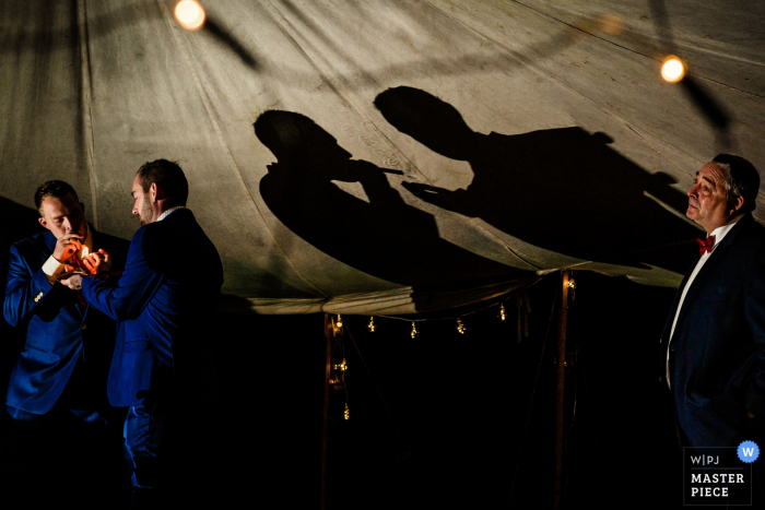 Photo by: <a href="https://www.wpja.com/contests/2019-v14/best-wedding-photographers/2553764">Steven Herrschaft - Lützelbach Hessen</a> Wedding Reportage Photography in Germany at Seehotel Niedernberg - Smoking with dad