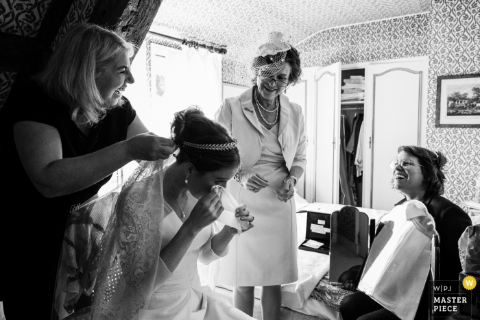 France Wedding Reportage Photographer - Getting Ready - Cry Laughing Bride 