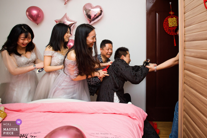Photo by: <a href="https://www.wpja.com/contests/2019-v14/best-wedding-photographers/2553896">Xiang Liu - Nanping </a> Fujian home actual wedding day photography - reception game