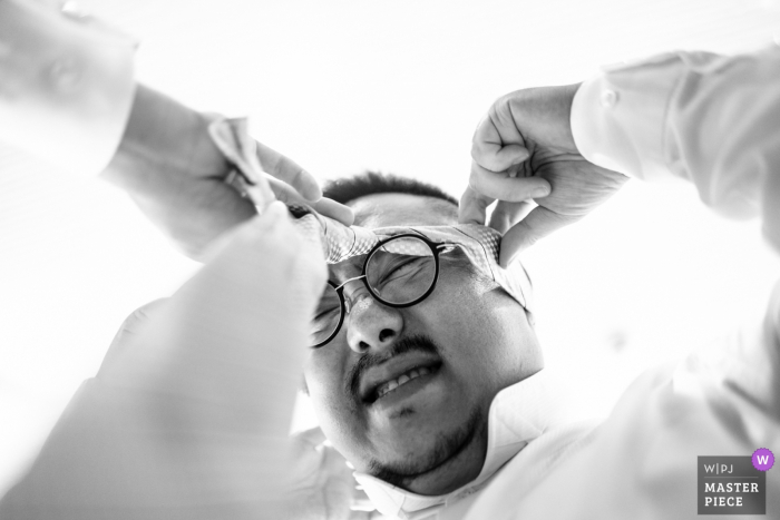 Photo by: <a href="https://www.wpja.com/contests/2019-v14/best-wedding-photographers/2554300">Cafa Liu - Richmond Hill Ontario</a> ALILA VILLAS ULUWATU. BALI WEDDING PHOTOGRAPHER - THE GROOMS MEN ARE GETTING READY