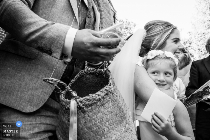 Photo by: <a href="https://www.wpja.com/contests/2019-v15/best-wedding-photographers/2554799">Joshua Dhondt - Antwerpen</a> Antwerpen Flanders wedding photographer | black and white, bride with flower girl