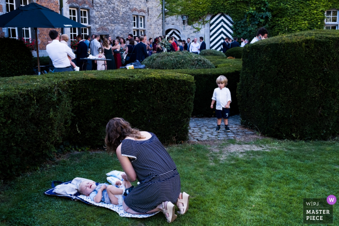 Photo by: <a href="https://www.wpja.com/contests/2019-v15/best-wedding-photographers/2554801">Joshua Dhondt - Antwerpen</a> wedding photography at Chateau de la Rocq, Feluy - diaper changing time at the reception party