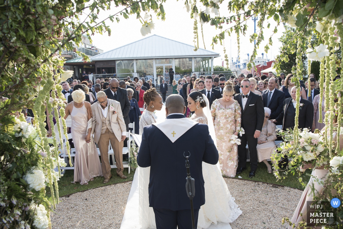 Photo by: <a href="https://www.wpja.com/contests/2019-v15/best-wedding-photographers/2555203">Adena Stevens - Hoboken New Jersey</a> Liberty House brides during wedding ceremony