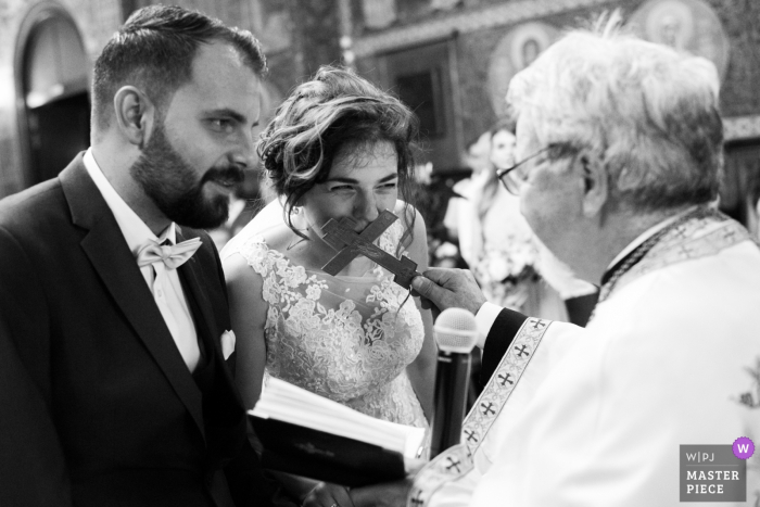 Photo by: <a href="https://www.wpja.com/contests/2019-v15/best-wedding-photographers/2555545">Boris Hristov - Sofia Sofia</a> Sofia-Bulgaria St. Nedelya Church - Wedding Photography — A moment from the orthodox church ceremony.