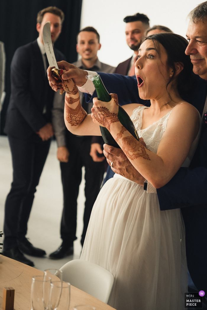 bride managed to open the champagne with a knife L'Eloi in Montreal Canada wedding venue photographer — bride managed to open the champagne with a knife (Part II)