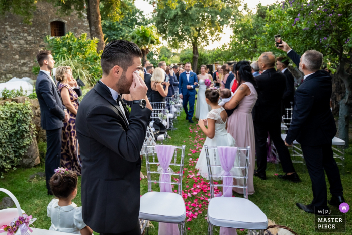 Photo by: <a href="https://www.wpja.com/contests/2019-v15/best-wedding-photographers/2556408">Salvo Moroni - Viagrande Catania</a> Lunario - Valverde wedding photography - The bridegroom does not hold back the tears when the bride arrives.