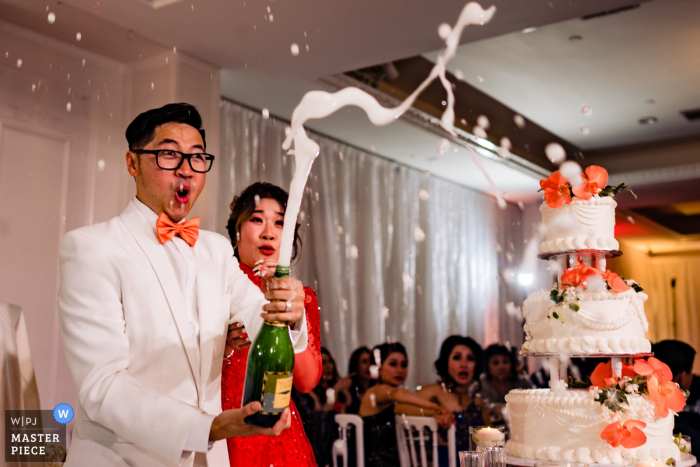 Photo by: <a href="https://www.wpja.com/contests/2019-v15/best-wedding-photographers/2556514">Leo Do - Fullerton California</a> CA wedding photographer: Wedding Reception Venue — Champagne time