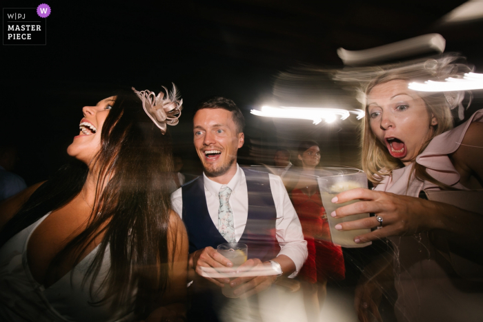 wedding guests dancing wedding venue photography at the Castello del Trebbio, Tuscany — wedding guests dancing