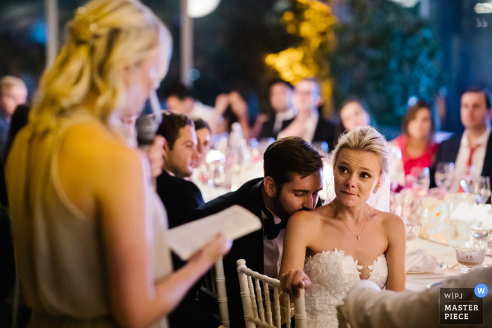 Bride and groom during the sisters' speech wedding photographer for: Villa La Vedetta, Florence — Bride and groom during the sisters' speech