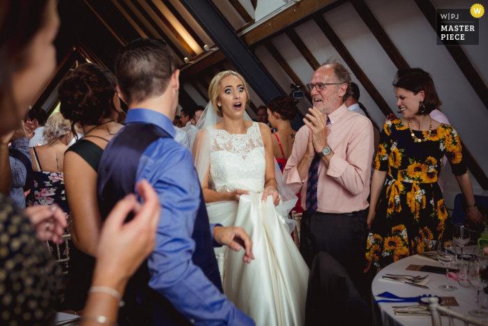 Photo by: <a href="https://www.wpja.com/contests/2019-v15/best-wedding-photographers/2557355">Mike Cook - Larbert Stirlingshire</a> Scotland Wedding Reception Venue Photographer — Bride sees life size cut out of herself for the first time upon entering the venue.