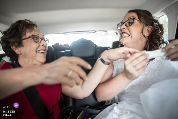 Photo by: <a href="https://www.wpja.com/contests/2019-v16/best-wedding-photographers/2560479">Nicolas Bernard - Kaysersberg </a> Saint-Louis - France Bride Photography on Wedding Day: My teeth are clean?