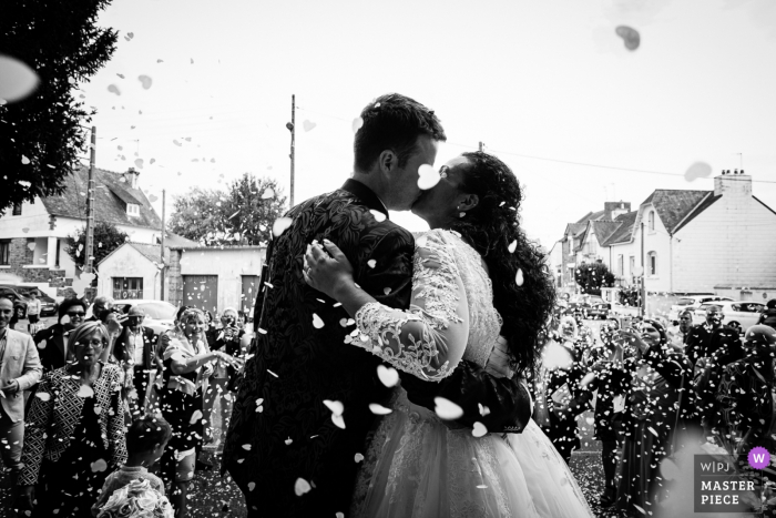 Photo by: <a href="https://www.wpja.com/contests/2019-v16/best-wedding-photographers/2560499">Didier Ropers - Lorient </a> Brittany Wedding Photography: Church - Hide kiss - bride and groom