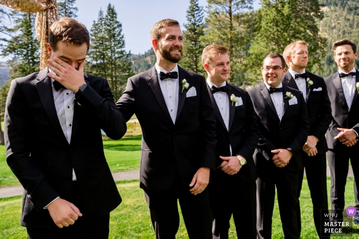 Photo by: <a href="https://www.wpja.com/contests/2019-v16/best-wedding-photographers/2560847">Shaunte Dittmar - Lake Tahoe California</a> Groom's first look of his bride as she walks down the isle | Wedding photography from Resort at Squaw Valley