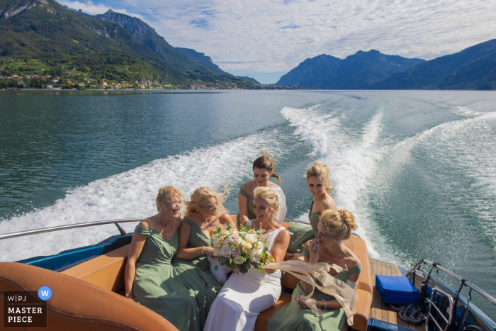 Photo by: <a href="https://www.wpja.com/contests/2019-v16/best-wedding-photographers/2560890">Luigi Rota - Lake Como Lecco</a> Bride on fast boat on Lake Como during the wedding day - Italy wedding photography