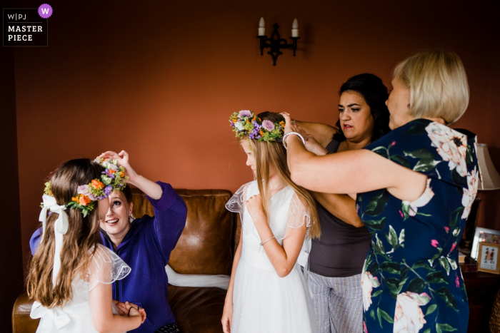 Photo by: <a href="https://www.wpja.com/contests/2019-v16/best-wedding-photographers/2561134">Annamarie Stepney - Horsham West Sussex</a> England wedding reportage photographer for West Sussex | Flower crown conundrum!