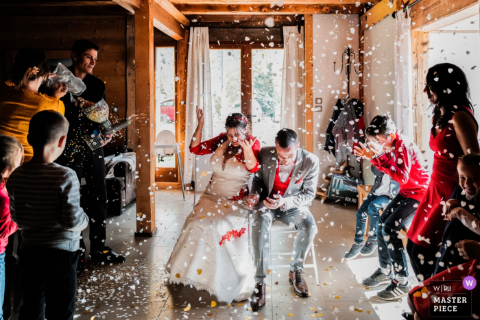 Photo by: <a href="https://www.wpja.com/contests/2019-v16/best-wedding-photographers/2561396">Jonathan Sylvoz - Annecy </a> Auvergne-RhĂ´ne-Alpes wedding reception venue photography | rain of confetti on the newlyweds