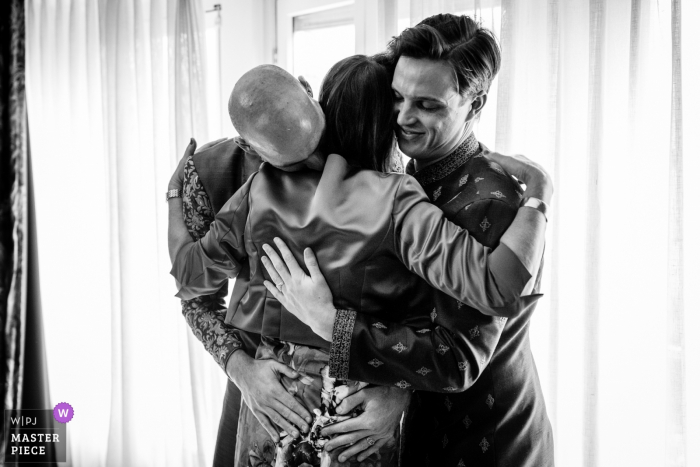 Photo by: <a href="https://www.wpja.com/contests/2019-v16/best-wedding-photographers/2562021">Leonard Walpot - Utrecht Utrecht</a> Wedding pictures from a home in amsterdam, netherlands - hug grooms and mother