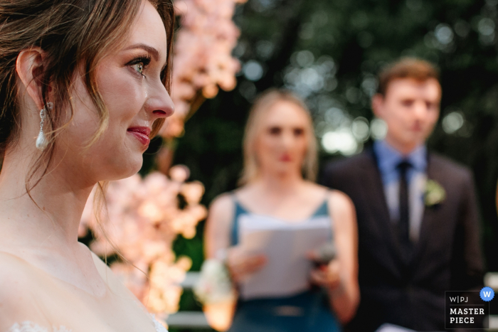 Foto: <a href="https://www.wpja.com/contests/2019-v16/best-wedding-photographers/2562142"> Renan Radici - Porto Alegre Rio Grande do Sul </a> Hochzeitsfotografie des Hotels Weiand Lajeado Brasil von der Zeremonie im Freien mit Tränen der Emotion