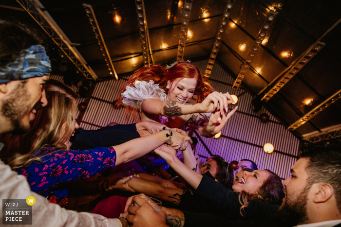 Photo by: <a href="https://www.wpja.com/contests/2019-v16/best-wedding-photographers/2562148">Renan Radici - Porto Alegre Rio Grande do Sul</a> Vinícola Laurentia - Barra do Ribeiro - Brasil | Wedding reception party photographer capturing action shots