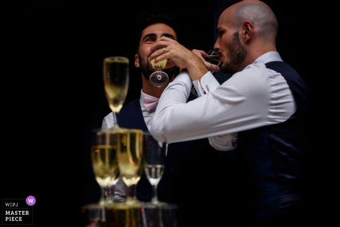 Photo by: <a href="https://www.wpja.com/contests/2019-v17/best-wedding-photographers/2563249">Julien Roman - Paris </a> Île-de-France reception photography - drinking champagne