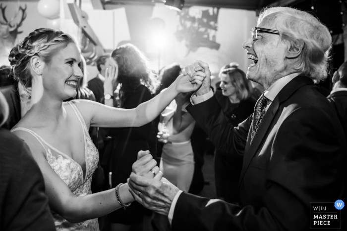 Photo by: <a href="https://www.wpja.com/contests/2019-v17/best-wedding-photographers/2563393">Caroline Elenbaas - Heijningen Noord Brabant</a> Slot Doddendael, Nijmegen, Venue Photographer | Bride is dancing with her grandfather at her wedding reception