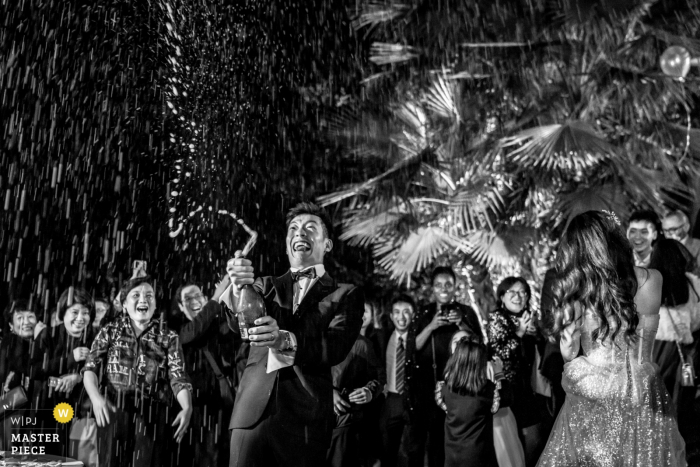 Photo by: <a href="https://www.wpja.com/contests/2019-v17/best-wedding-photographers/2563667">Will Tee - Taipei City </a> The groom opened the champagne and sprinkled it all over the sky. Castello di Torcrescenza Roma Nord, Italy wedding photographer.