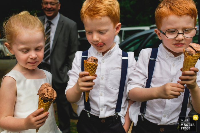 Photo by: <a href="https://www.wpja.com/contests/2019-v17/best-wedding-photographers/2563884">Mauricio Mussi - Canoas Rio Grande do Sul</a> Herstmonceux Church wedding photography - UK children having icecream at the wedding reception