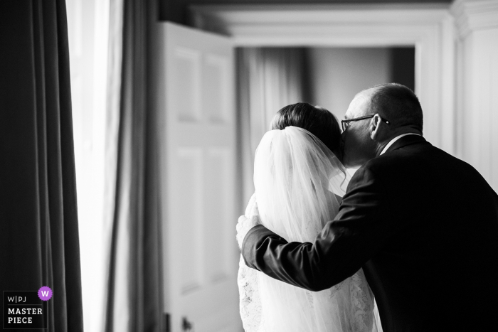 Photo by: <a href="https://www.wpja.com/contests/2019-v17/best-wedding-photographers/2564408">Peter Rowen - Ashbourne Meath</a> Luttrellstown Castle, Dublin. Ireland wedding photography | The Bride's Dad gives her one last kiss before they leave for the ceremony