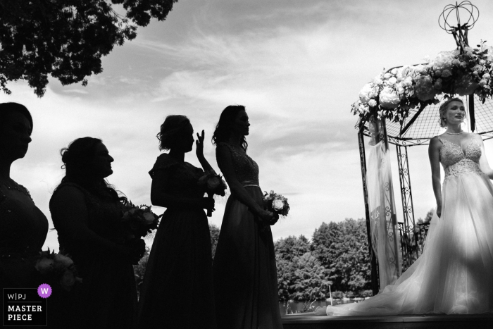 Photo by: <a href="https://www.wpja.com/contests/2019-v17/best-wedding-photographers/2564540">Jeremy Fiori - Angers </a> Chateau Allure du lac outdoor wedding photography | Emotional ceremony